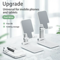 GXCT Aluminum Phone Stand in Pearl White, adjustable for phones and tablets, featuring folding storage