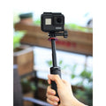 GXCT MT-09 Mini 2-in-1 Vlog Tripod in hand, ideal for stabilizing action camera shots