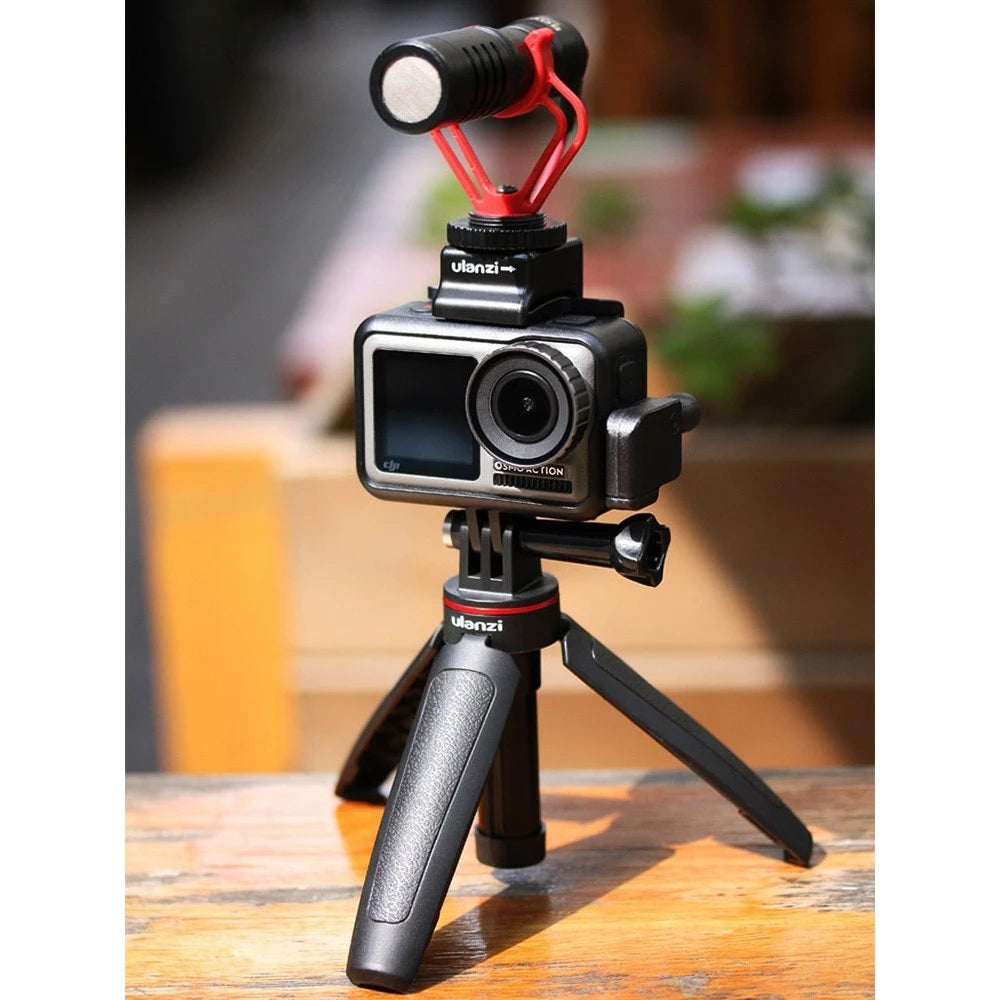 GXCT MT-09 Mini 2-in-1 Vlog Tripod supporting a compact camera with microphone attachment