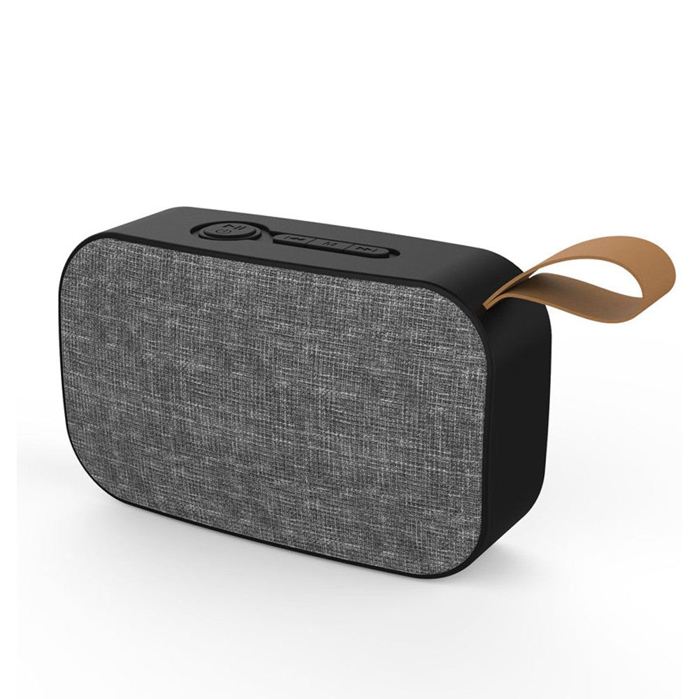 VMIDirect Wireless Speaker with sleek design and fabric texture for portable audio enjoyment
