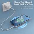 Magnetic Wireless Power Bank charging a phone while connected to an outlet for dual charging