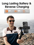 User holding the Hohem iSteady M6 smartphone gimbal outdoors, showcasing its long-lasting battery and reverse charging feature