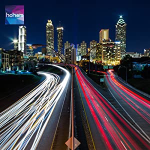 Hohem iSteady Mobile Plus gimbal capturing smooth nighttime cityscape with light trails