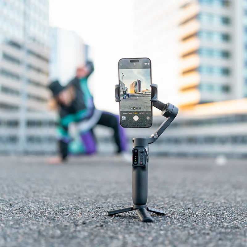 Hohem iSteady X3 SE for vlogging, featuring a smartphone mounted on a stable gimbal stand