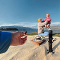 8K Waterproof Action Camera capturing family fun and celebrations by the lake in a scenic landscape