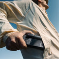 User holding an 8K Waterproof Action Camera ready for outdoor adventures