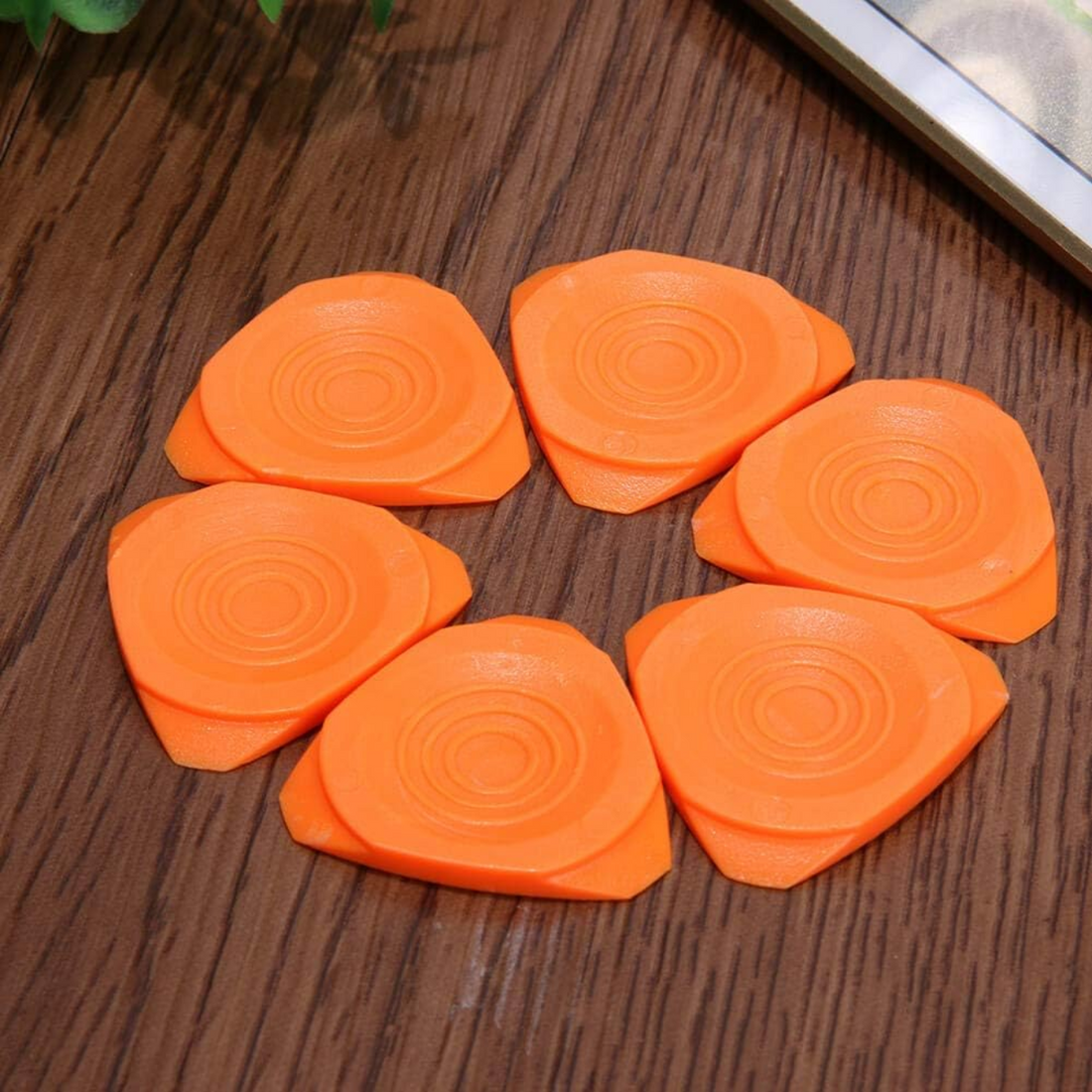 Professional phone repair tool kit with prying tools and opening picks in bright orange