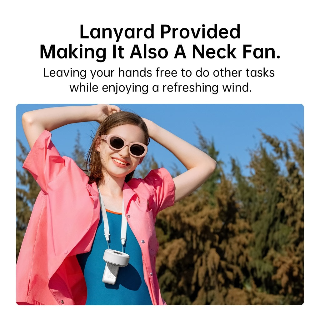 Woman wearing Jisulife mini fan portable with neck lanyard for hands-free cooling outdoors