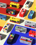 Various Kodak Charmera Mini Digital Camera models in vibrant colors displayed on a colorful background