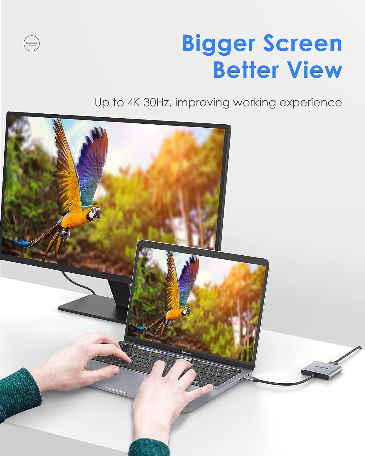 LENTION 3-in-1 USB C adapter connected to laptop displaying vibrant nature image on an external monitor