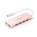USB C hub with HDMI and Ethernet in rose gold, featuring multiple USB ports for connectivity