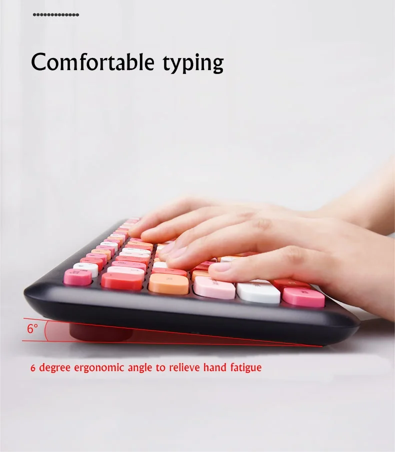 Hands typing on Mofii 666 keyboard and mouse for PC with colorful keys and ergonomic 6 degree angle