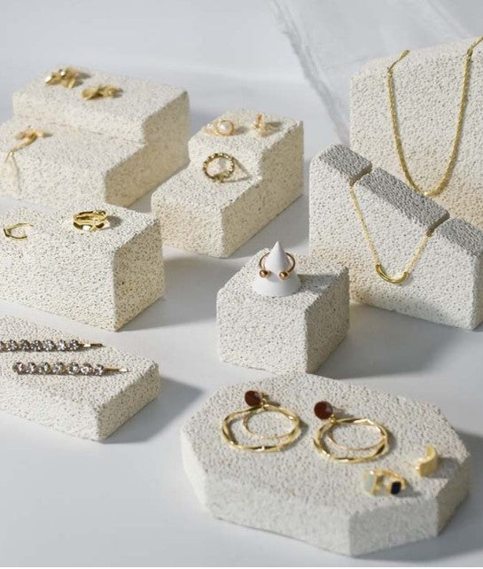 Natural Stone Props for displaying jewelry with a textured surface and modern design