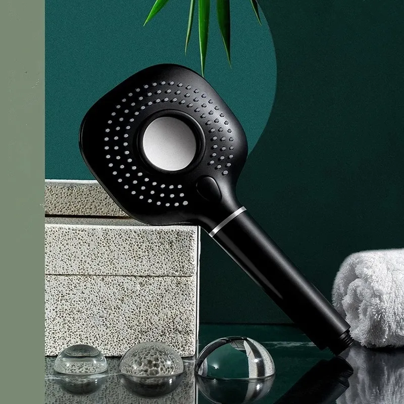 Natural Stone Props arranged with a black handheld tool and decorative elements for photography