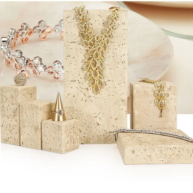 Natural Stone Props display for jewelry showcasing necklaces and bracelets elegantly arranged