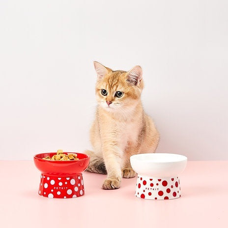 VMIDirect Ceramic Feeding Bowl for pets, featuring a playful design in red and white with polka dots