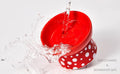 Bright red ceramic feeding bowl with white polka dots, easy to clean and dishwasher safe