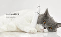 VMIDirect Pet Trimmer Clippers in a sleek design, resting next to a relaxed cat.