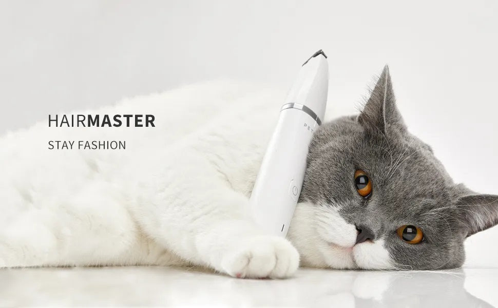 VMIDirect Pet Trimmer Clippers in a sleek design, resting next to a relaxed cat.