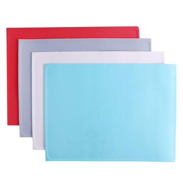 Silicone Pet Mat in various colors including red, gray, white, and blue for easy pet cleanup