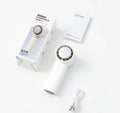 VMIDirect portable fan in white with a sleek design, charger, and user manual for on-the-go use
