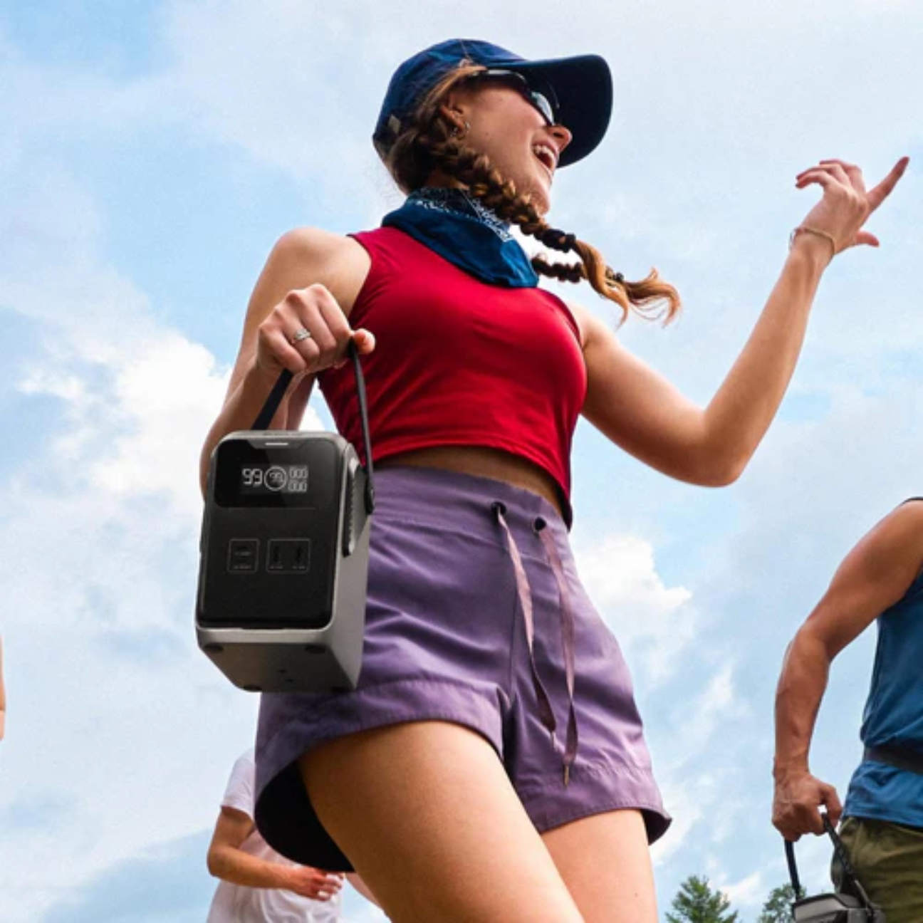 VMIDirect Portable power station being carried by a woman during an outdoor event
