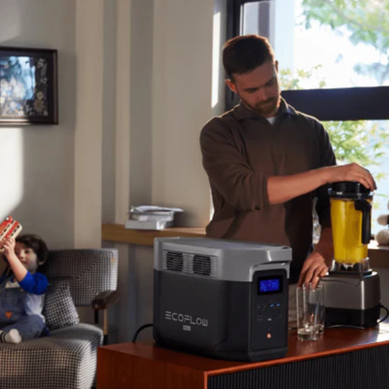 VMIDirect portable power station powering a blender while a child plays nearby
