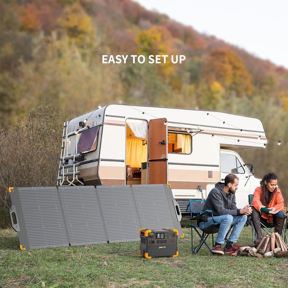 Portable solar power panel set up at a campsite beside a camper van