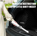 Portable Vacuum Cleaner in action, removing dirt from a car trunk with wireless convenience