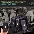 Restaurant Guest Pager System with multiple black pagers and charging station for efficient customer service