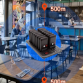 Restaurant Guest Pager System with multiple pagers on charging base in a modern restaurant setting