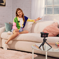 Rode Wireless ME Microphone System used with a camera for capturing clear audio in a cozy living room setting