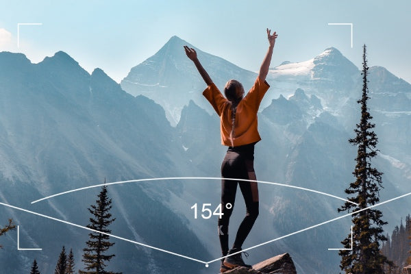 VMIDirect Action Camera with Active Dual Screen showcasing breathtaking mountain scenery and user celebrating outdoors