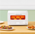 VMIDirect Smart Steam Oven with a bright interior showcasing baked goods and cooked dishes