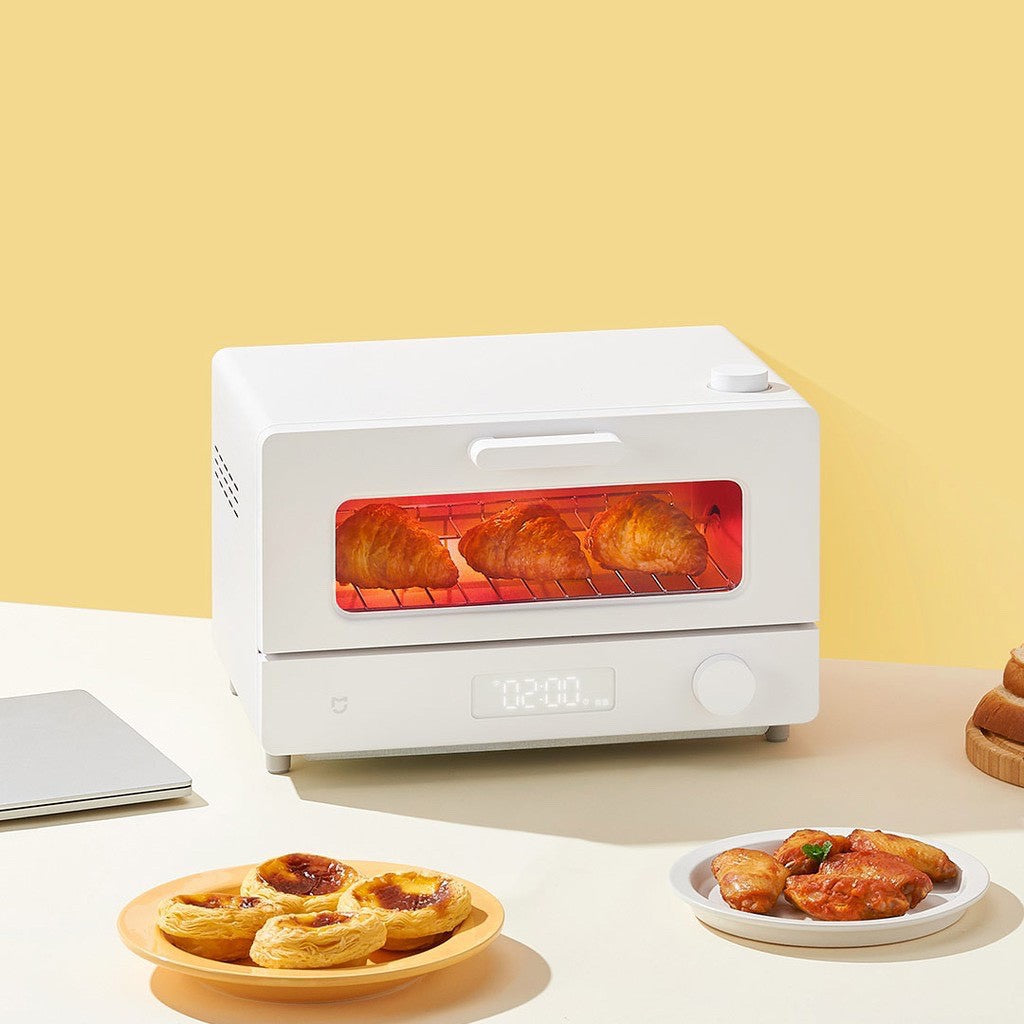 VMIDirect Smart Steam Oven in white with a display and pastries on plates for easy cooking