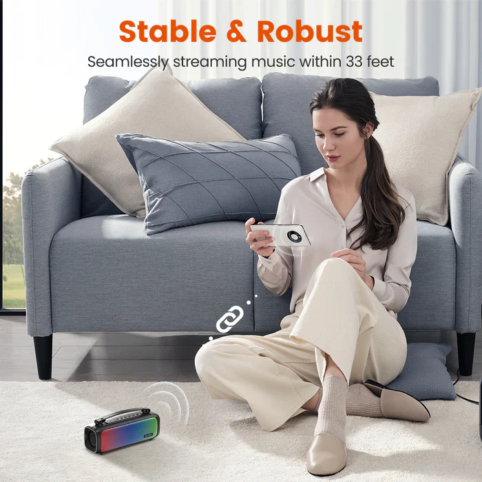 VMIDirect Portable Bluetooth Speaker streaming music seamlessly within 33 feet, placed on a living room floor