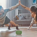 Couple exercising with VMIDirect Portable Outdoor Speaker on the floor, enhancing their workout experience