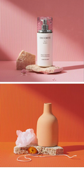Striped Photography Background Paper in Pink and Coral with Decorative Bottle and Vase Props