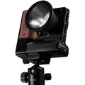 Synco COLBOR HLR light reflector kit mounted on a tripod for enhanced photography lighting