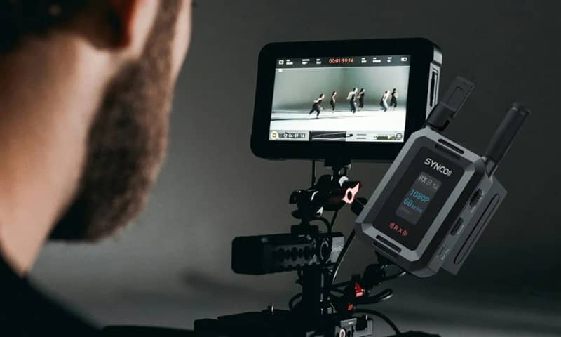 VMIDirect Wireless Video System connected to a camera, displaying live video feed for filmmakers