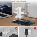 Tessan 11 outlet surge protector extension cord with multiple devices plugged in on a desk