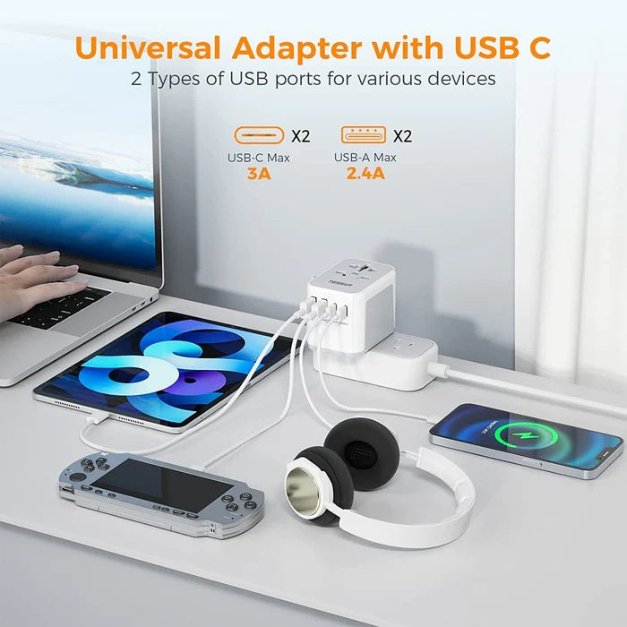 Portable universal charger for travel with USB C and USB A ports powering multiple devices