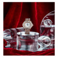 Transparent Acrylic Geometric Photo Props with a luxury watch and decorative glass orbs on red fabric