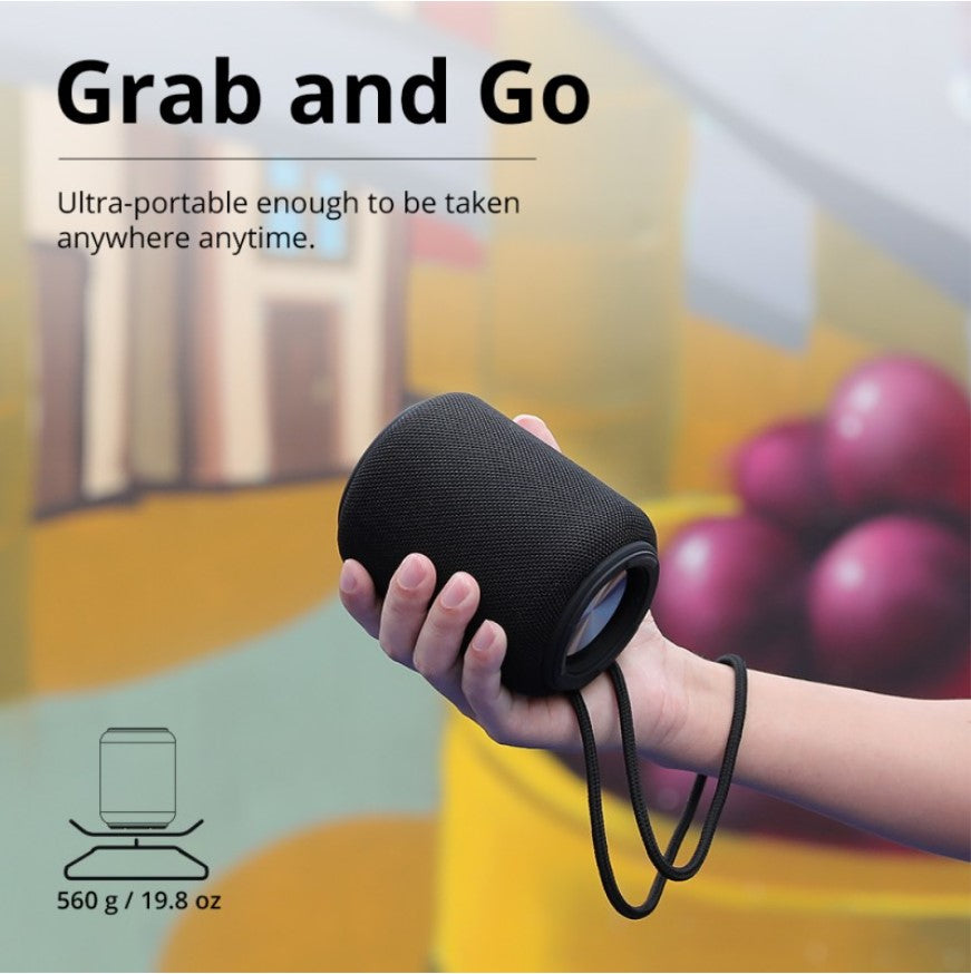 VMIDirect Mini Bluetooth Speaker in hand, designed for ultra-portable use anywhere anytime