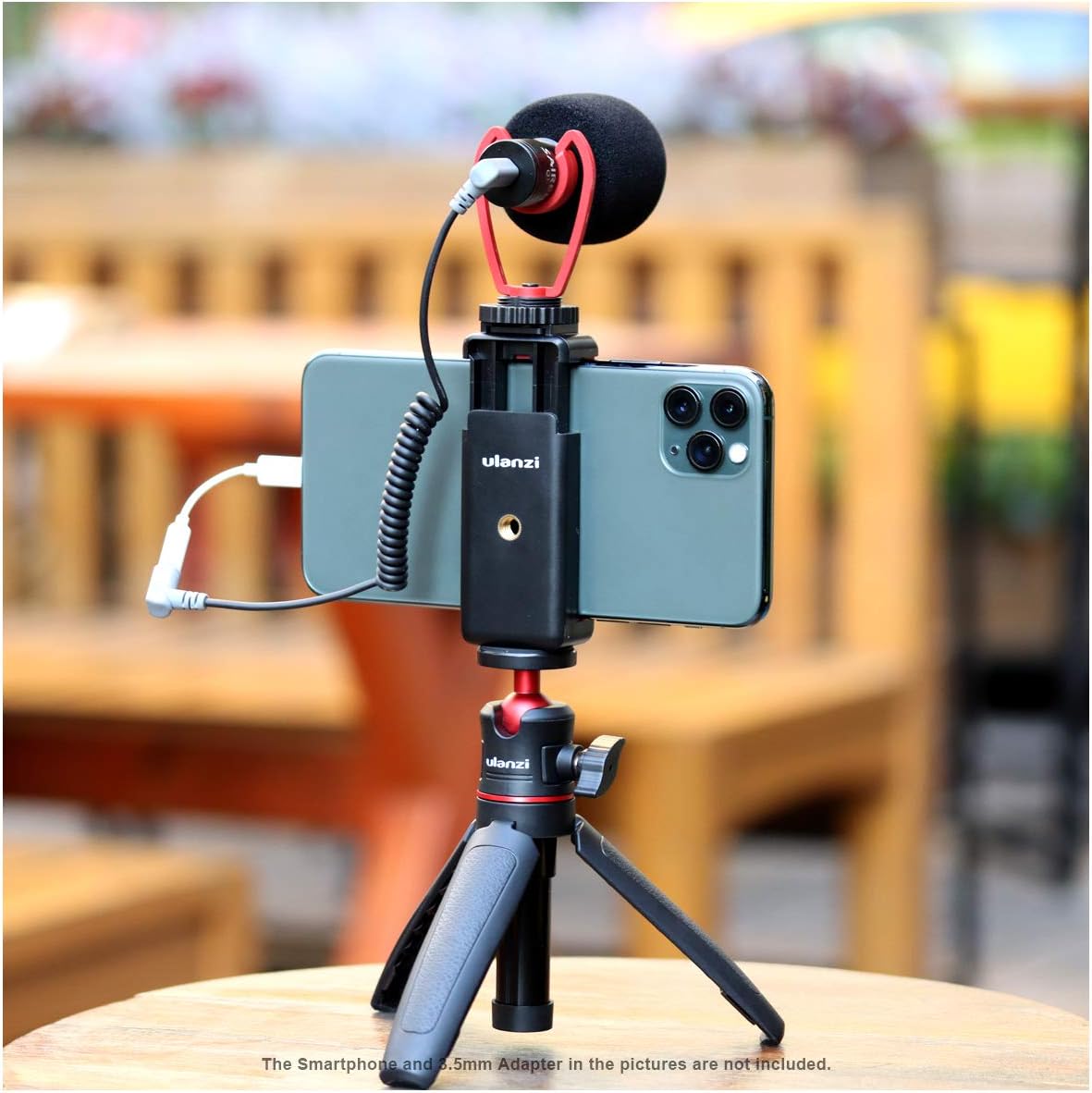VMIDirect Adjustable Mount Clip for Mobile Cellphone on a tripod with a microphone attached