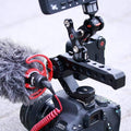 Ulanzi UURig R005 cold shoe mount attached to a camera with a microphone and accessories for optimal recording setup