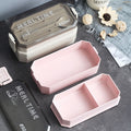 2-Layer Portable Plastic Bento Lunch Box in Pink and Black for Convenient Meal Storage