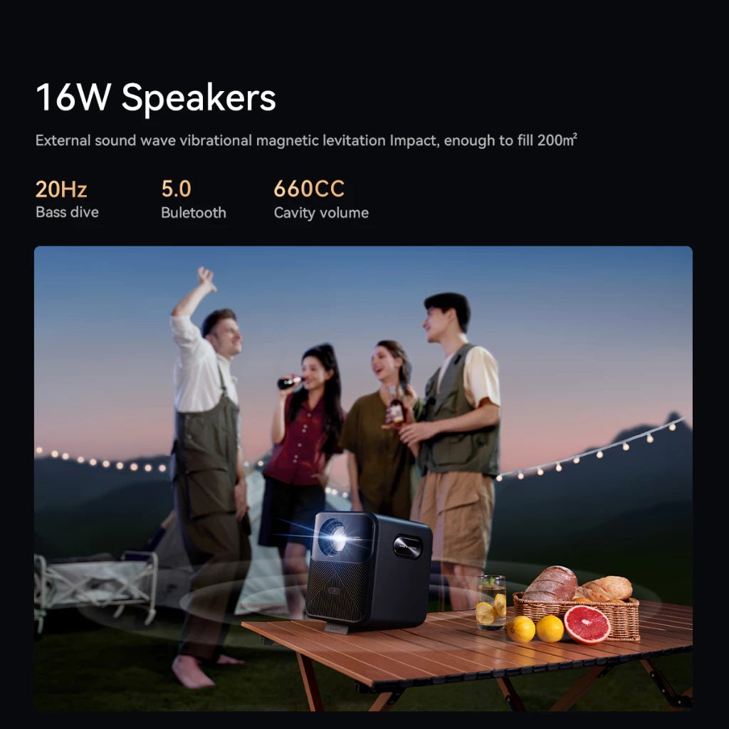 Wanbo Mozart 1 Pro Android projector on table projecting image during outdoor evening party with friends