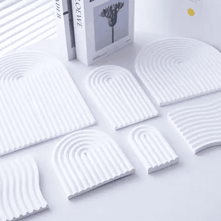 Wave Plaster Cutting Board Decoration set with various accessories and decorative items displayed