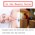 Wireless caregiver pager system emergency buzzer worn by spa customer for staff assistance